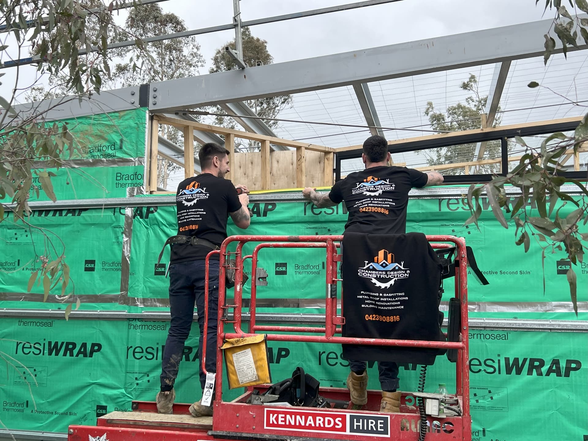 Professional construction team working on modern building project in Melbourne